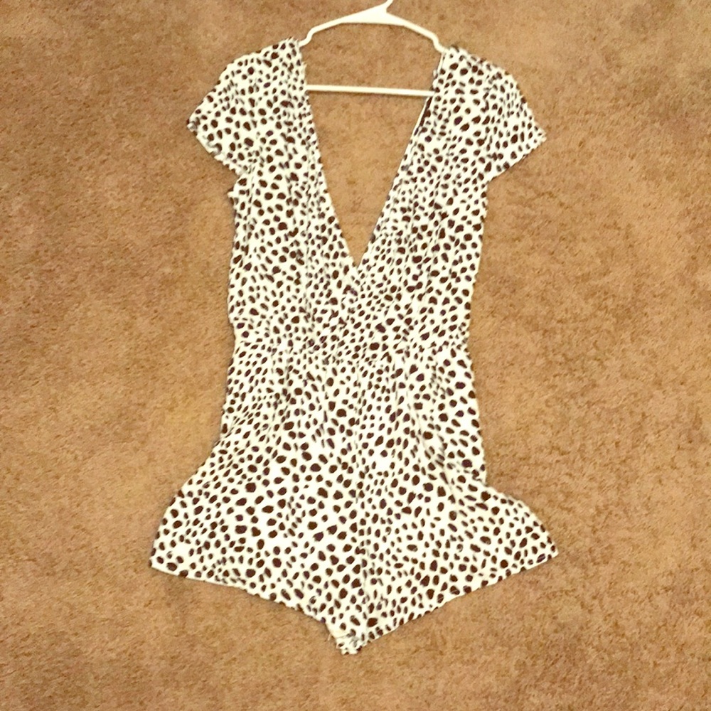 Black/white romper size small never worn.